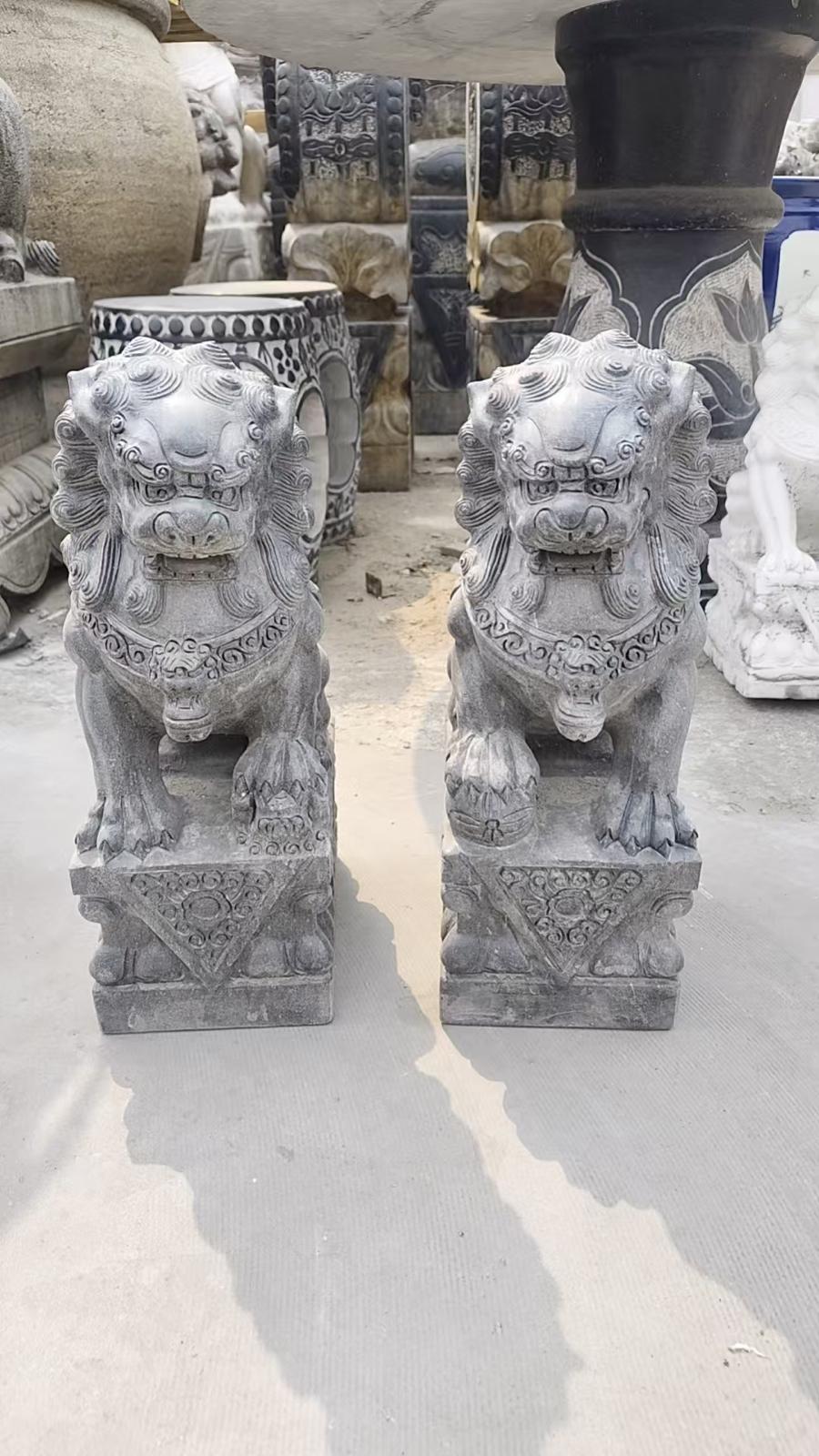 Foo dogs hand carved grey stone