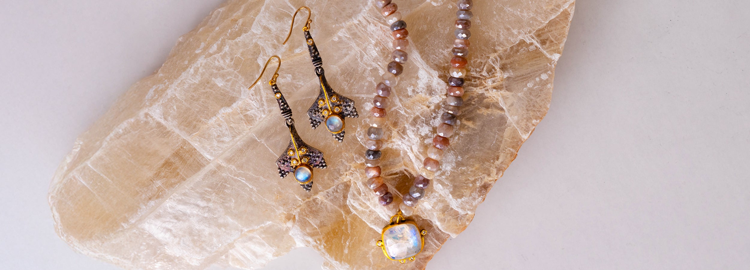 One-of-a-kind handcrafted gemstone jewelry, artisan earrings, necklaces, and mala beads curated for Sukhmani's Santa Fe and Albuquerque jewelry showrooms